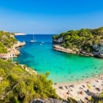 Beautiful beach Cala Llombards at Majorca island with tropic turquoise sea water, Mediterranean Sea Spain.