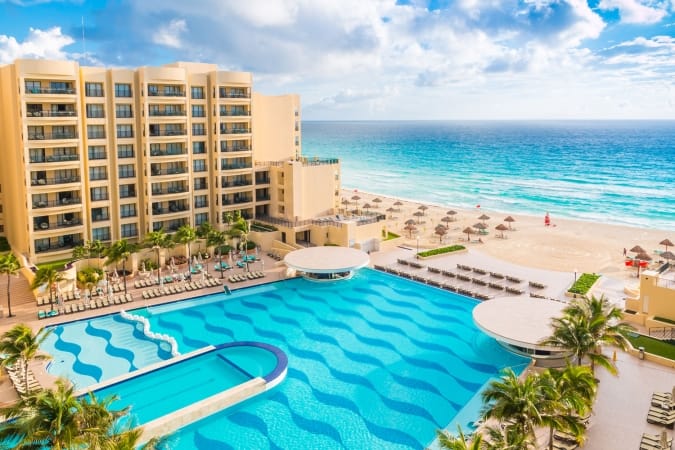 Luxury all-inclusive The Royal Sands resort with beautiful beach and swimming pool.