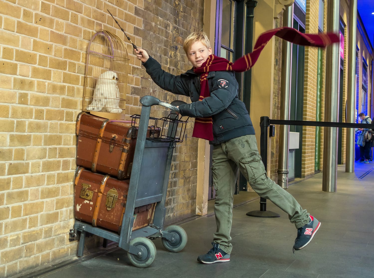 Kings Cross station wall visited by fans of Harry Potter 