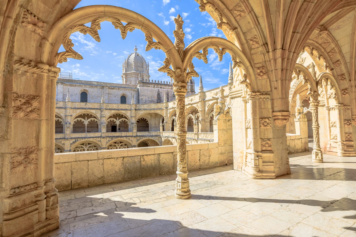 Beautiful reticulated vaulting on courtyard or cloisters of Hieronymites Monastery, Mosteiro dos Jeronimos, famous Lisbon landmark in Belem district and Unesco Heritage.