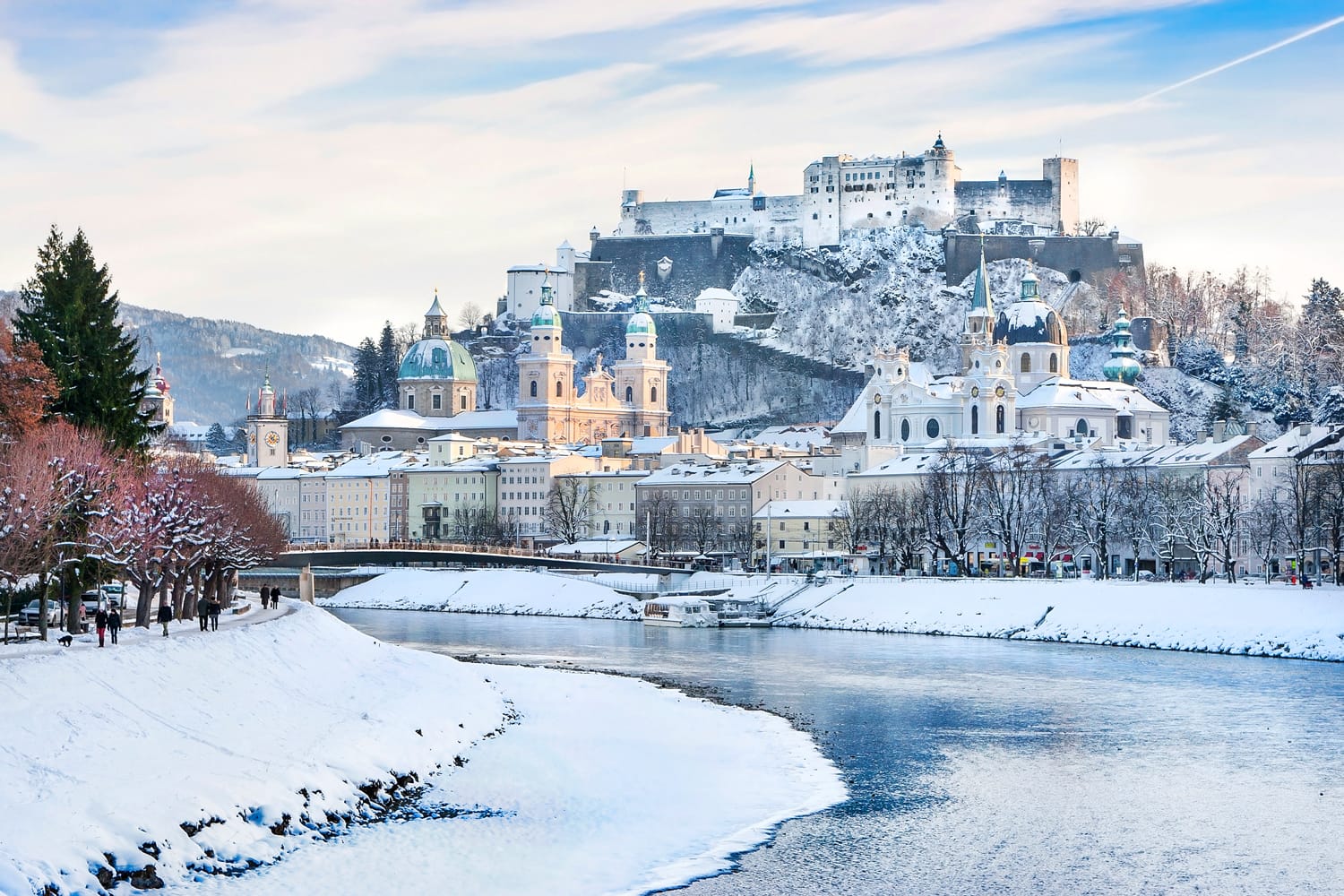 Beautiful view of Salzburg skyline with Festung Hohensalzburg and river Salzach in winter, Salzburger Land, Austria