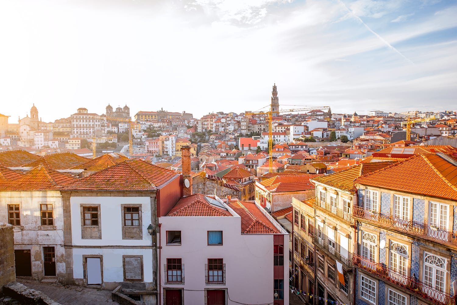 CItyscape view with beautiful old buildings during the sunset light in Porto city, Portugal