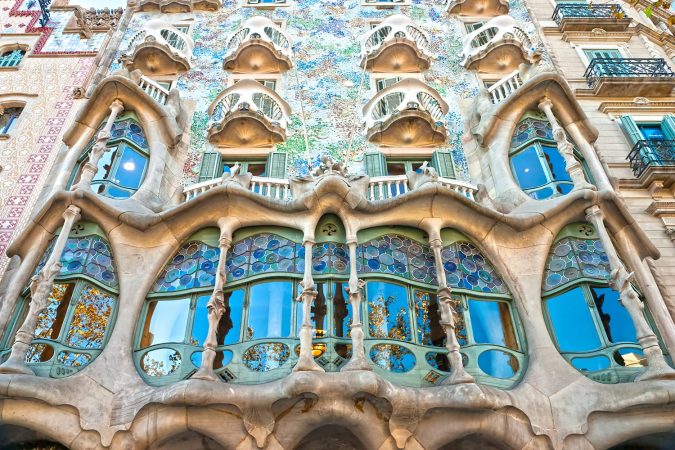 The facade of the house Casa Batllo (also could the house of bones) designed by Antoni Gaudi­ with his famous expressionistic style in Barcelona, Spain