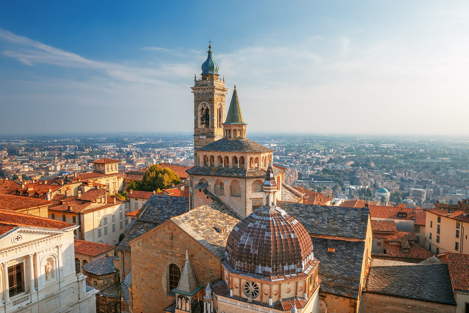Scenic view of the old town city center and Basilica of Santa Maria Maggiore and Cappella Colleoni in Citta Alta. Bergamo, Italy.