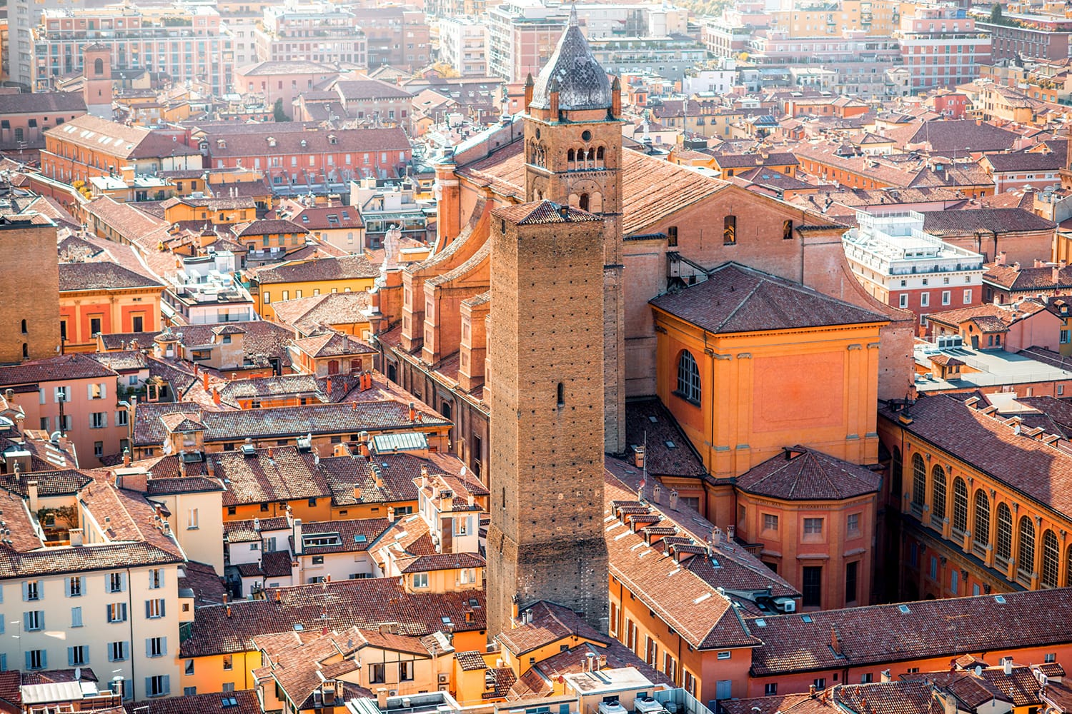 Aerial cityscape view from the tower on Bologna old town with Metropolitan cathedral San Pietro in Italy