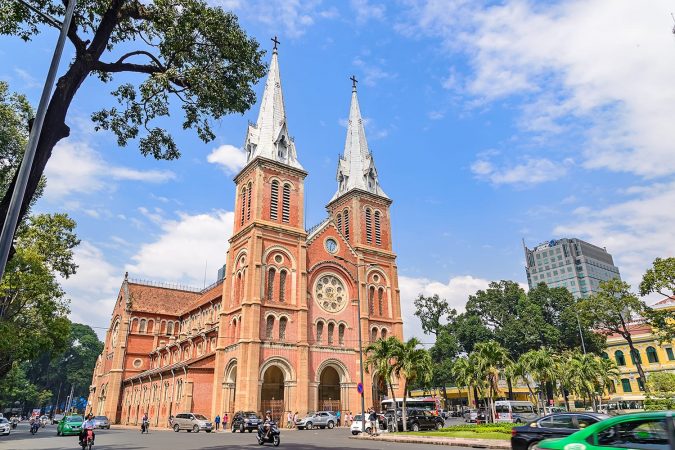 Saigon Notre-Dame Cathedral Basilica (Basilica of Our Lady of The Immaculate Conception) on blue sky background in Ho Chi Minh city, Vietnam