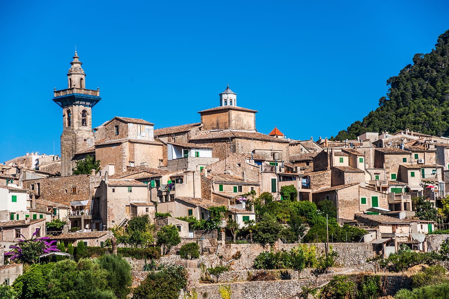 Beautiful view of the small town Valldemossa situated in picturesque mountains on Mallorca island, Spain.