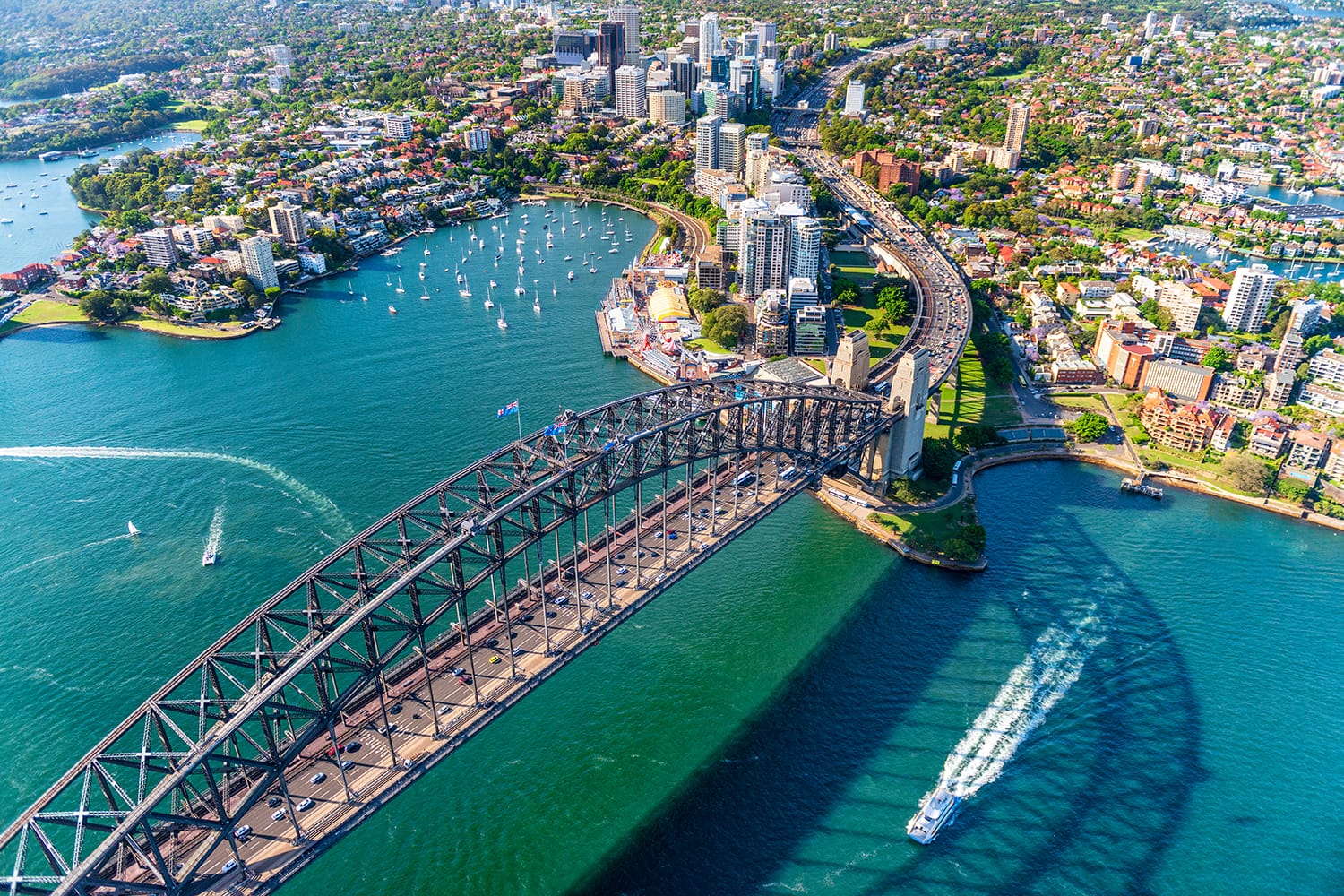 Helicopter view of Sydney Harbor Bridge and Lavender Bay, New South Wales, Australia.