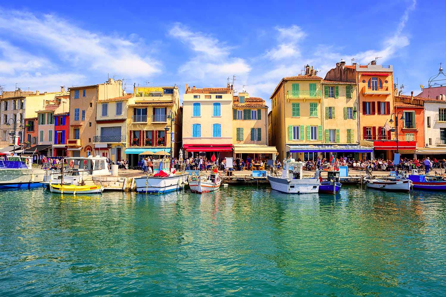 Colorful traditional houses on the promenade in the port of Cassis town, Provence, France