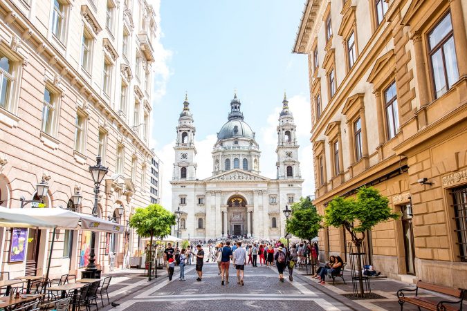Street view with saint Stephen cathedral in the center of Budapest city