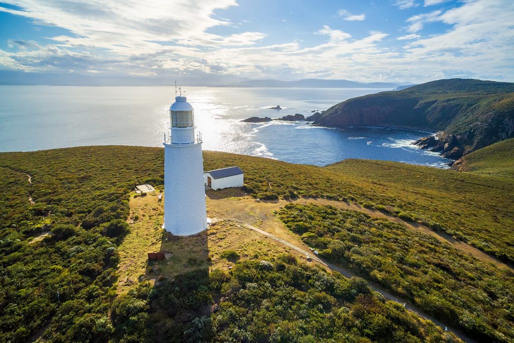 Aerial view of Bruny Island Lighthouse at sunset. Tasmania, Australia