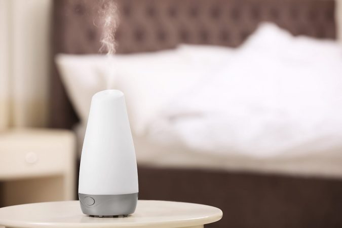 Portable travel humidifier in hotel room