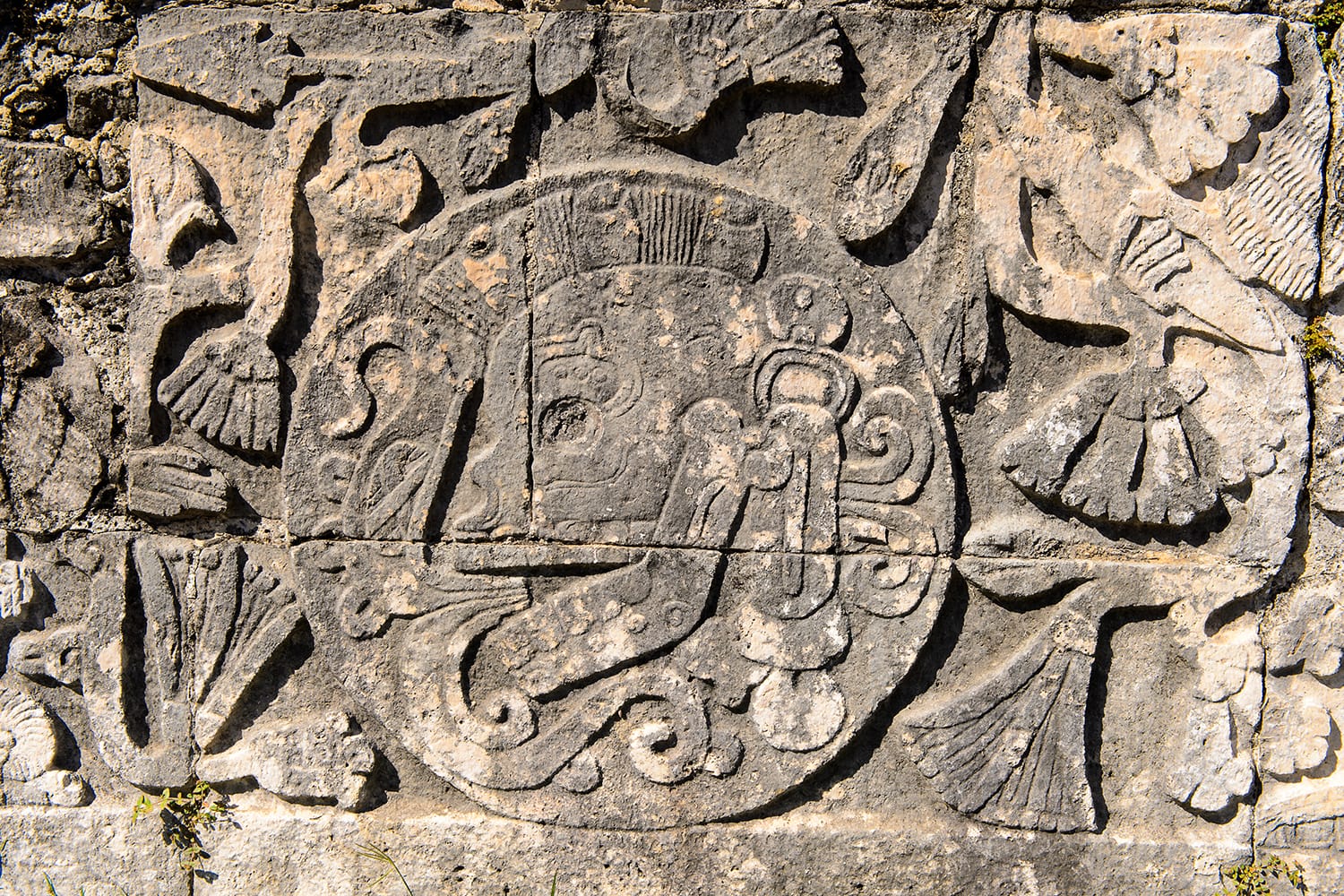 Carvings on a temple of Chichen Itza, Mexico