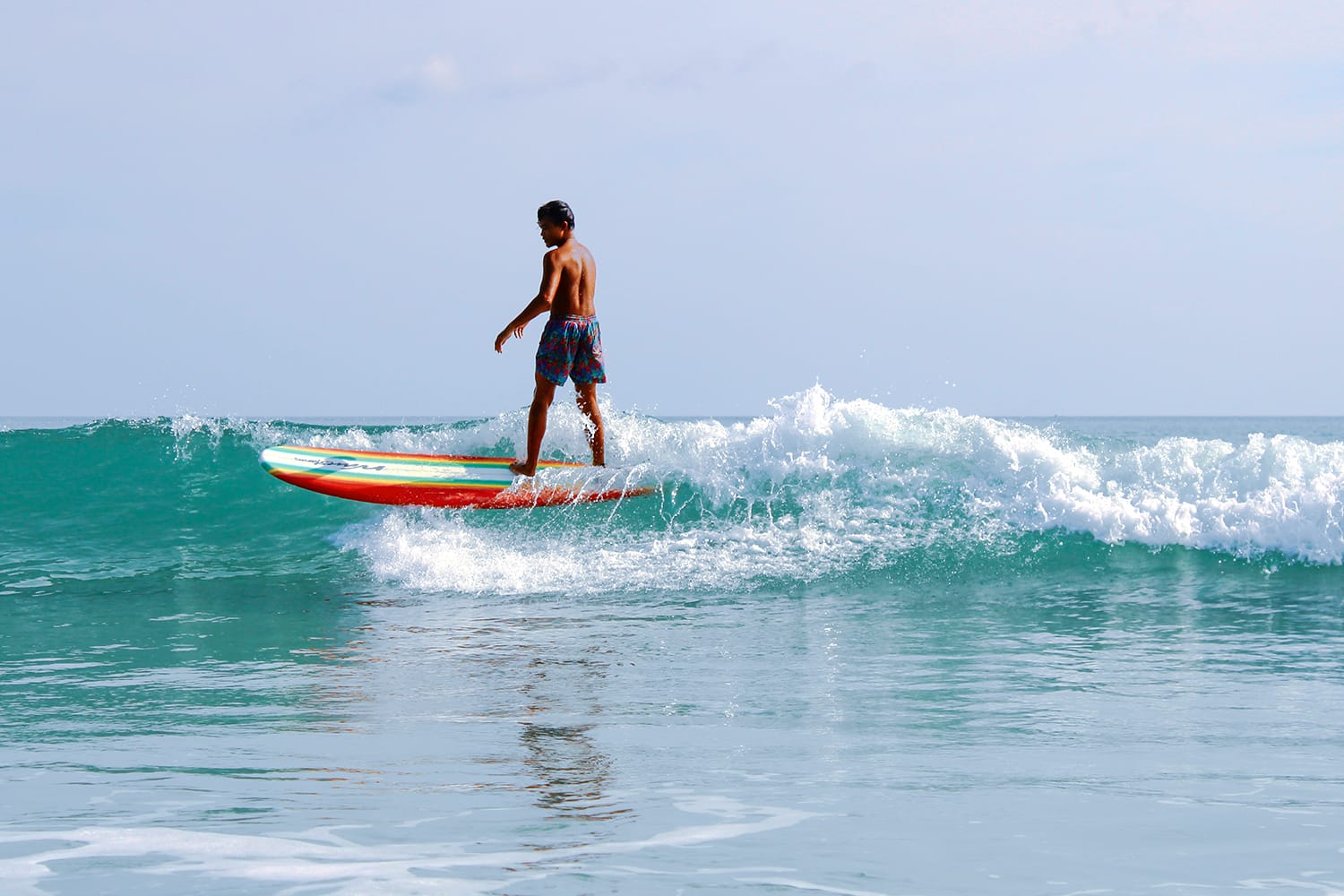 Boy surfing in Gubat Sorsogon, Philippines