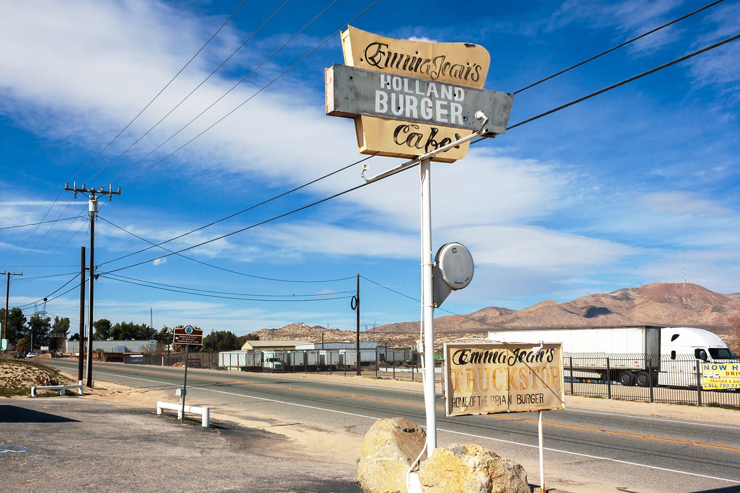 Vintage sign for Emma Jean's Holland Burger Cafe, in Victorville, California on San Bernardino County Road 66, also known as Route 66.