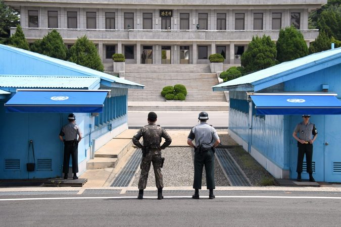 The UN soldiers standing in front of the North Korea office building at Korean Demilitarized Zone, the bolder area between North Korea and South Korea, Panmunjom