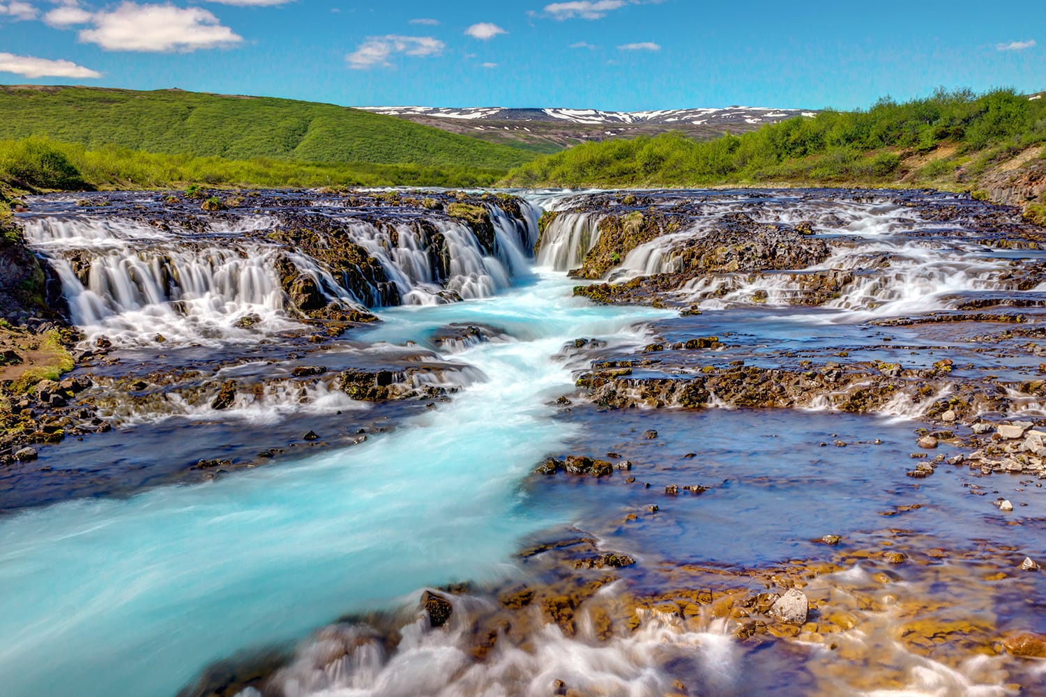 The lovely Bruarfoss waterfall in Iceland on a sunny day
