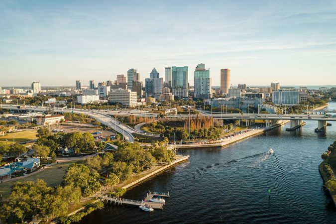 Grandious aerial view over the Hillsborough river leading to downtown Tampa, Florida