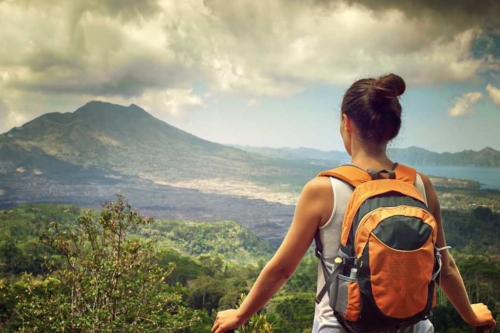 Woman traveling with packable backpack in Bali