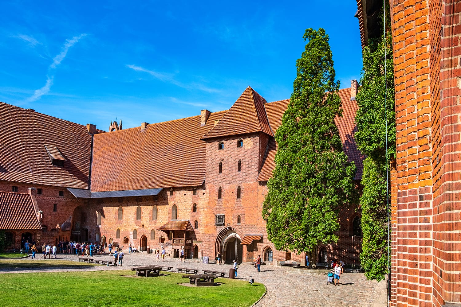 Middle Castle fortress inner courtyard with the gate tower of the Medieval Teutonic Order Castle in Malbork, Poland