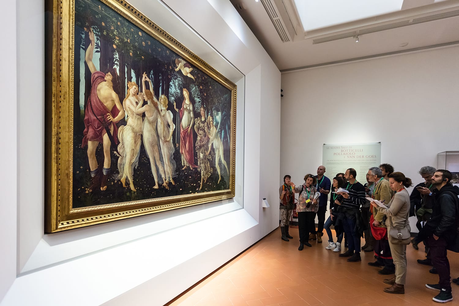 Visitors in Botticelli hall of Uffizi Gallery, Florence, Italy