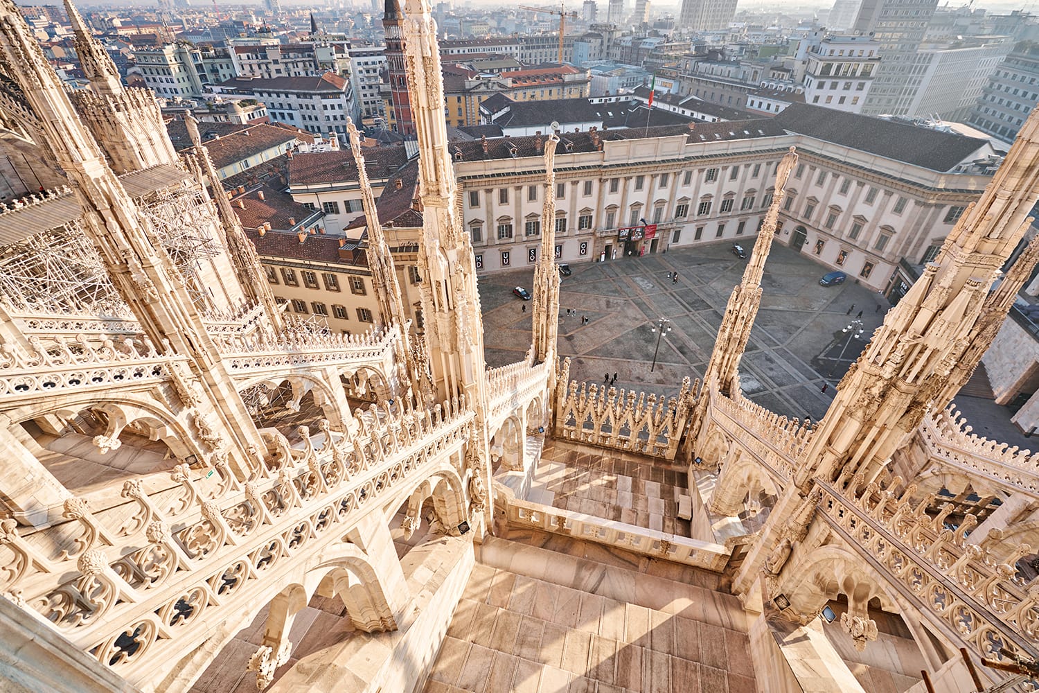 Amazing view of old Gothic spires. Milan Cathedral roof on sunny day, Italy.