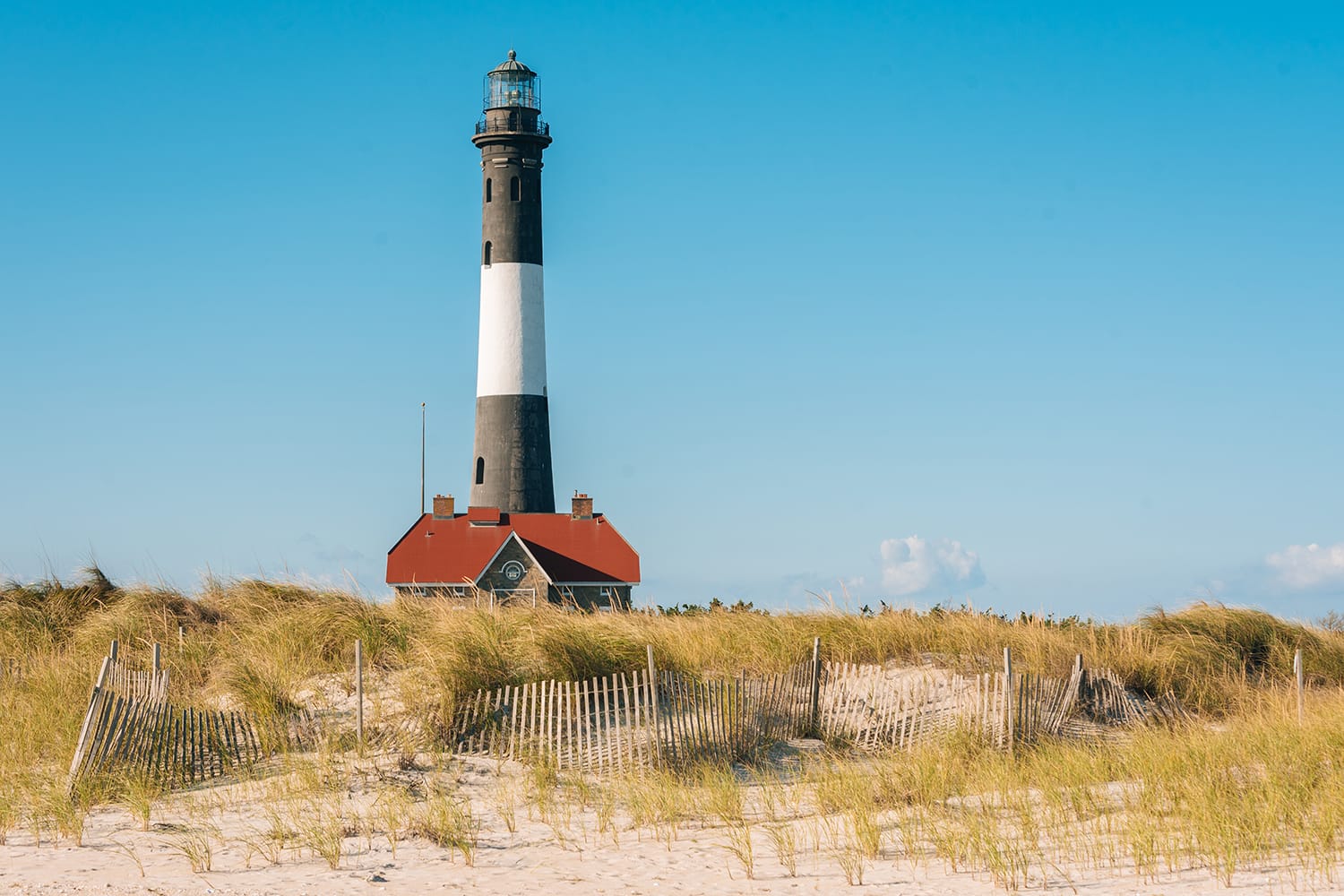 Sand dunes and Fire Island Lighthouse on Long Island, New York