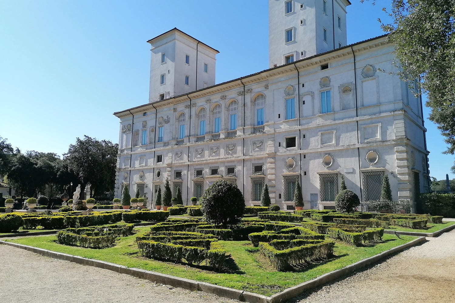 View of the rear facade of the Galleria Borghese inside the public park of Villa Borghese.
