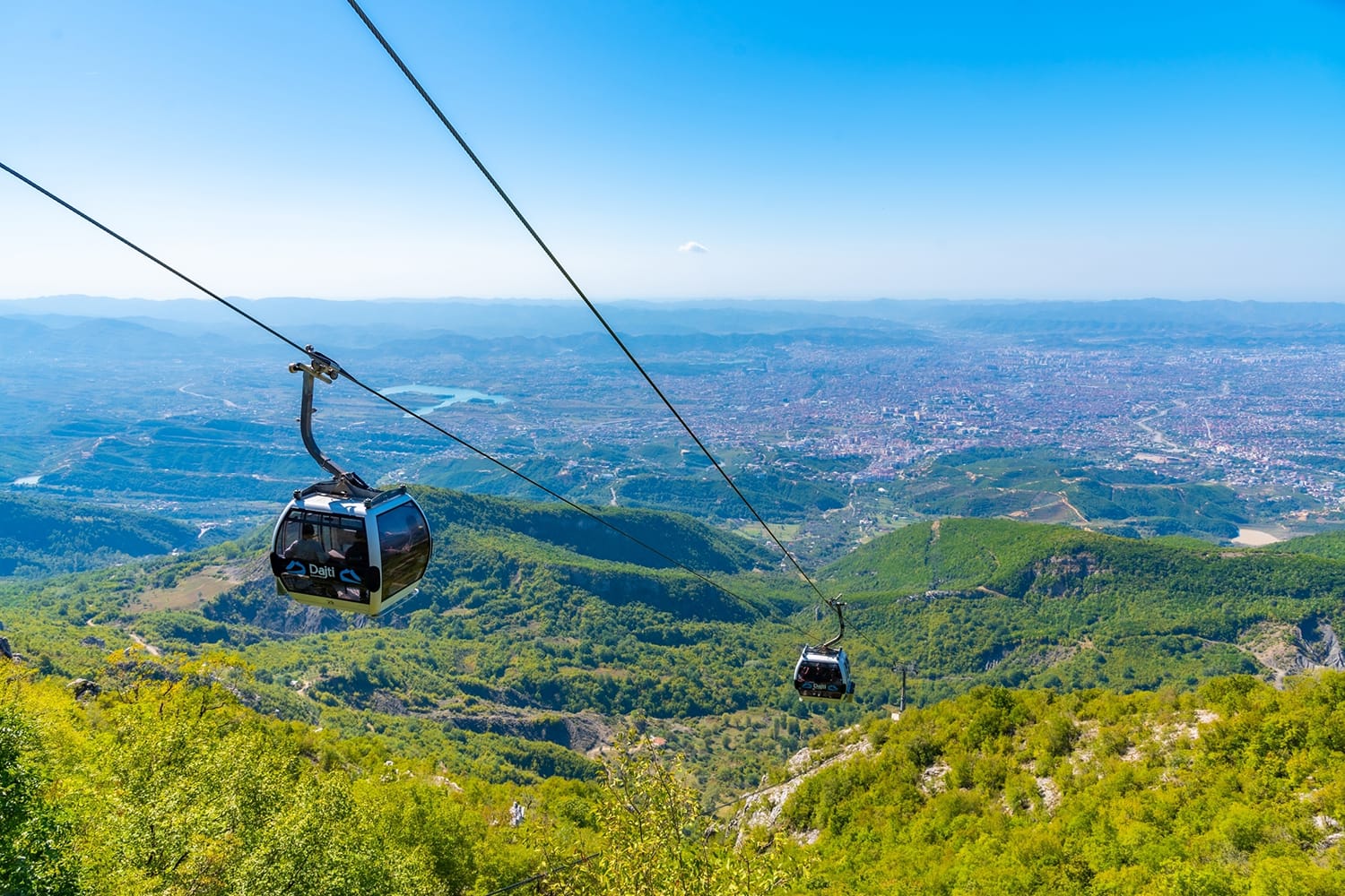 Gondola lift reaching stop at Mount Dajti near Tirana, Albania