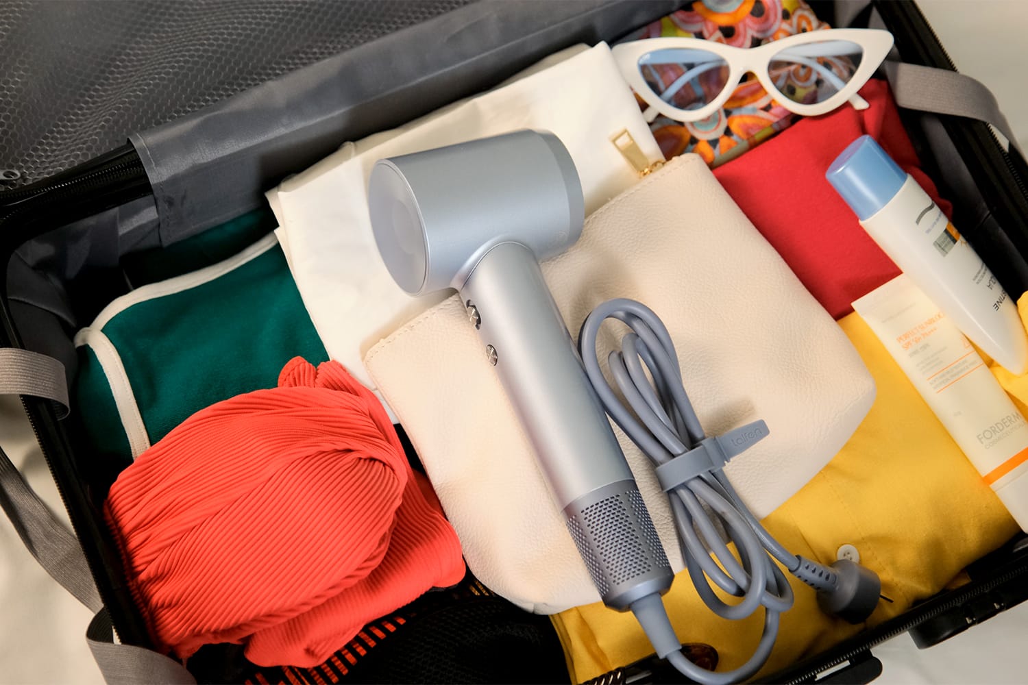 Laifen Swift Hair Dryer in luggage
