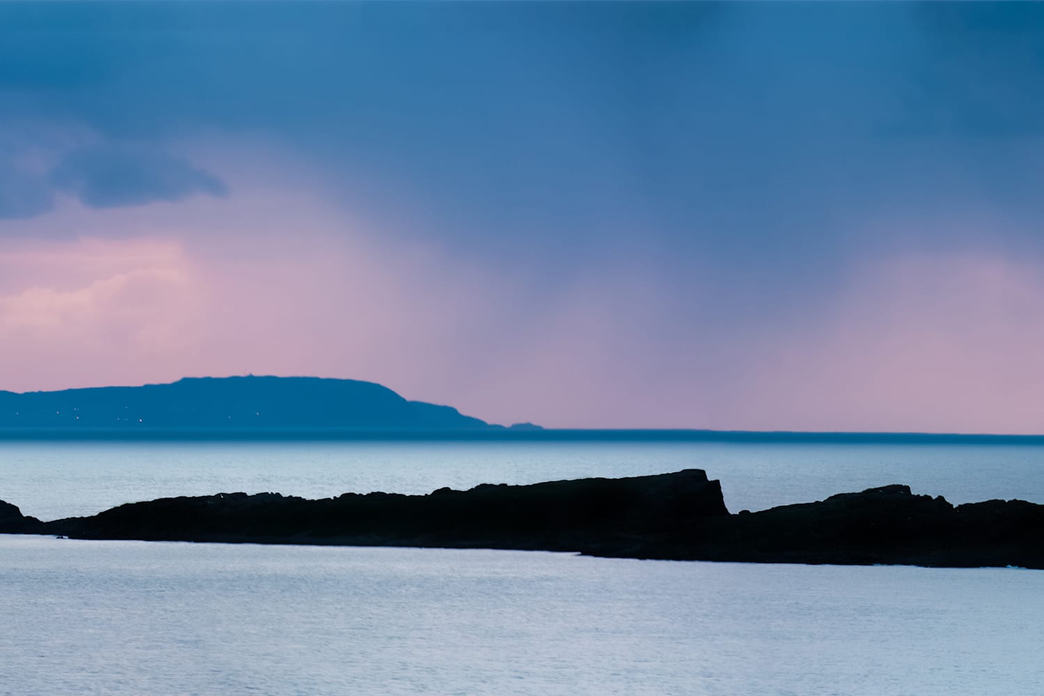 Panoramic view of the Skerries Islands out the coast of Portrush at sunset over the atlantic ocean