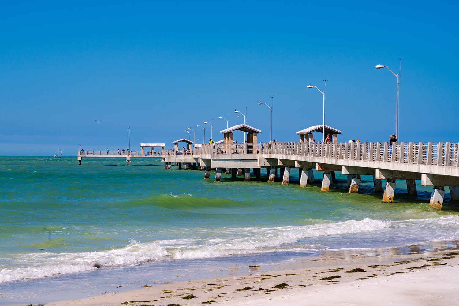 a long pier in the Gulf of Mexico in Fort De Soto Park