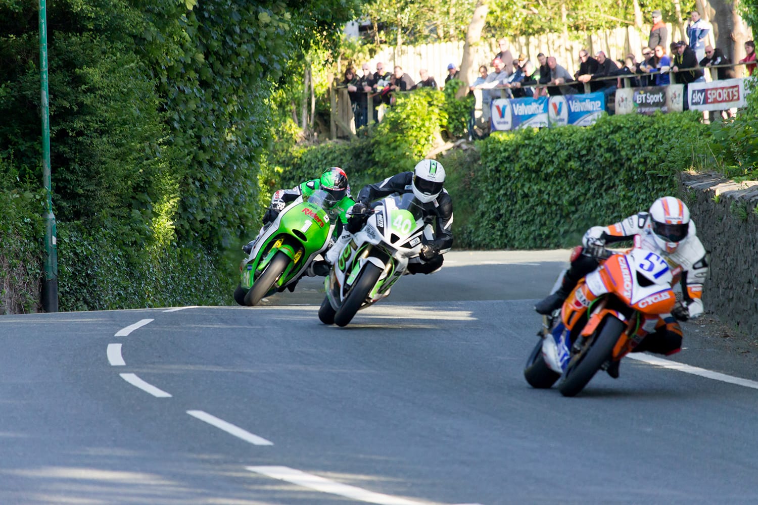Riders undertake qualifying laps of the annual TT (Tourist Trophy) Union Mills.