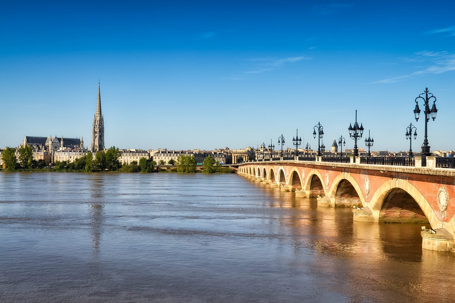 Bordeaux river bridge with St Michel cathedral