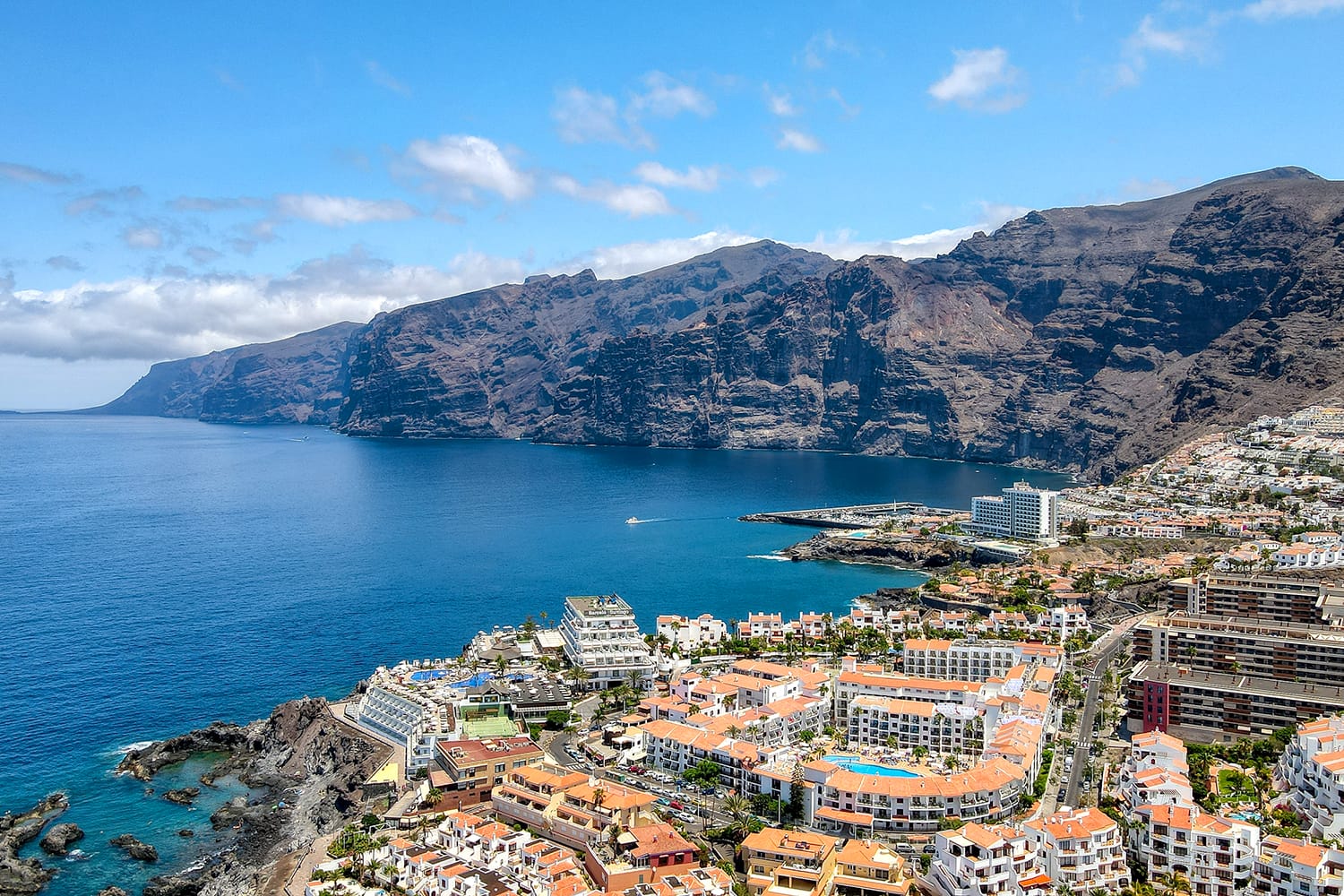 Aerial photos of the coast and tourist area of Puerto Santiago and Los Gigantes, Tenerife, Canary Islands