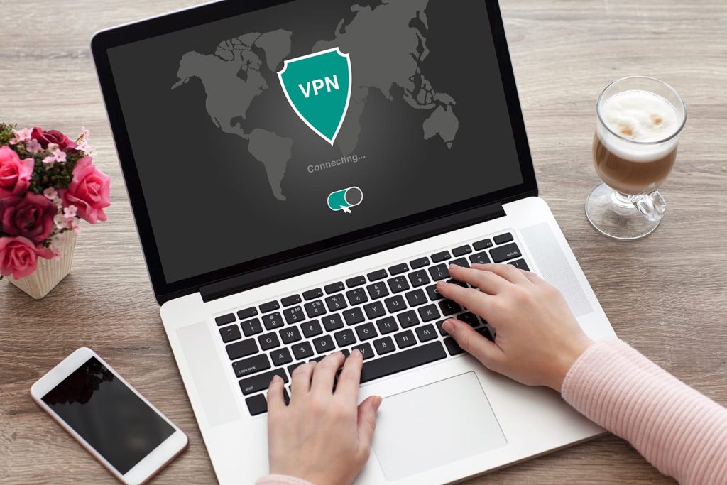 Woman opening up VPN on her laptop