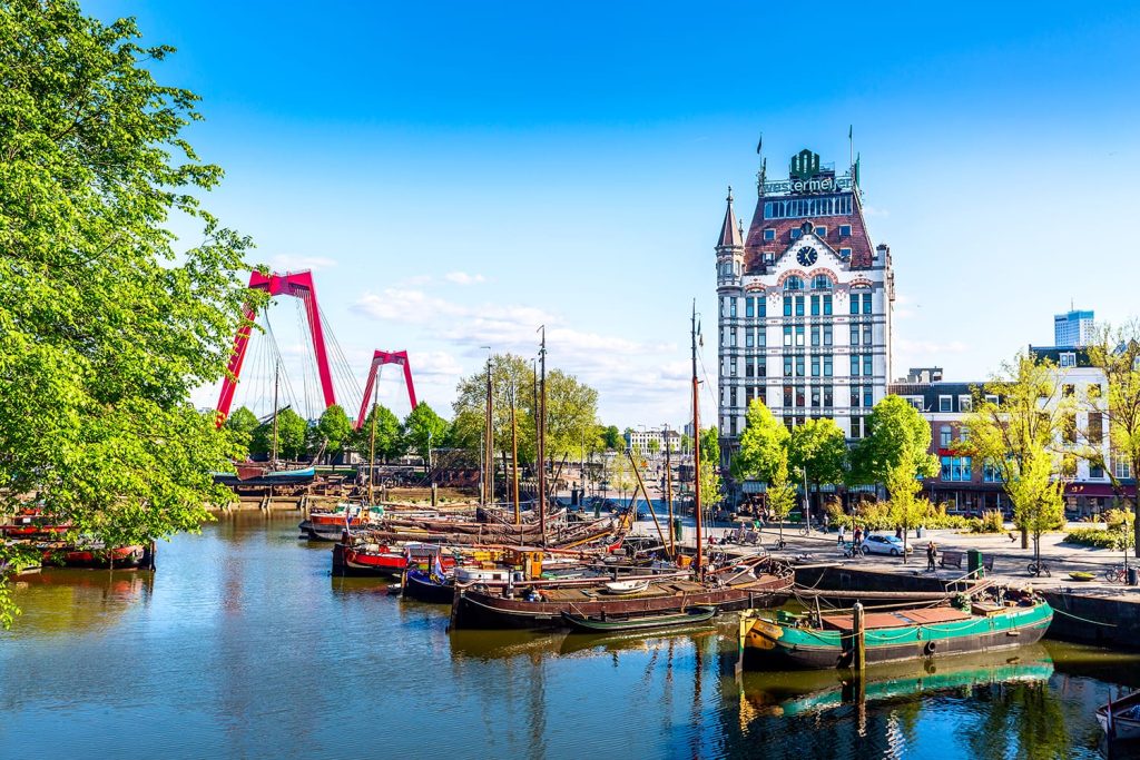 Oude Haven harbor, Willemsbrug bridge, old ship yard dock, Ships, Openlucht Binnenvaart Museum during sunny summer day in Rotterdam.