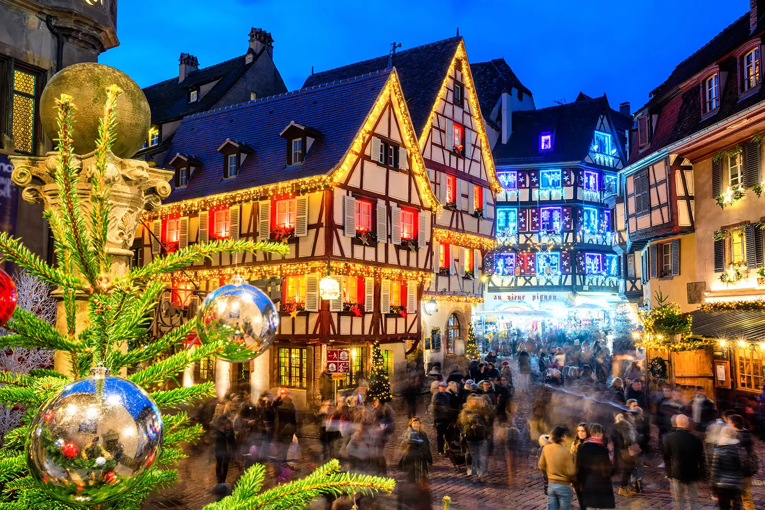Traditional illuminated Christmas market in the Old town of Colmar, Alsace