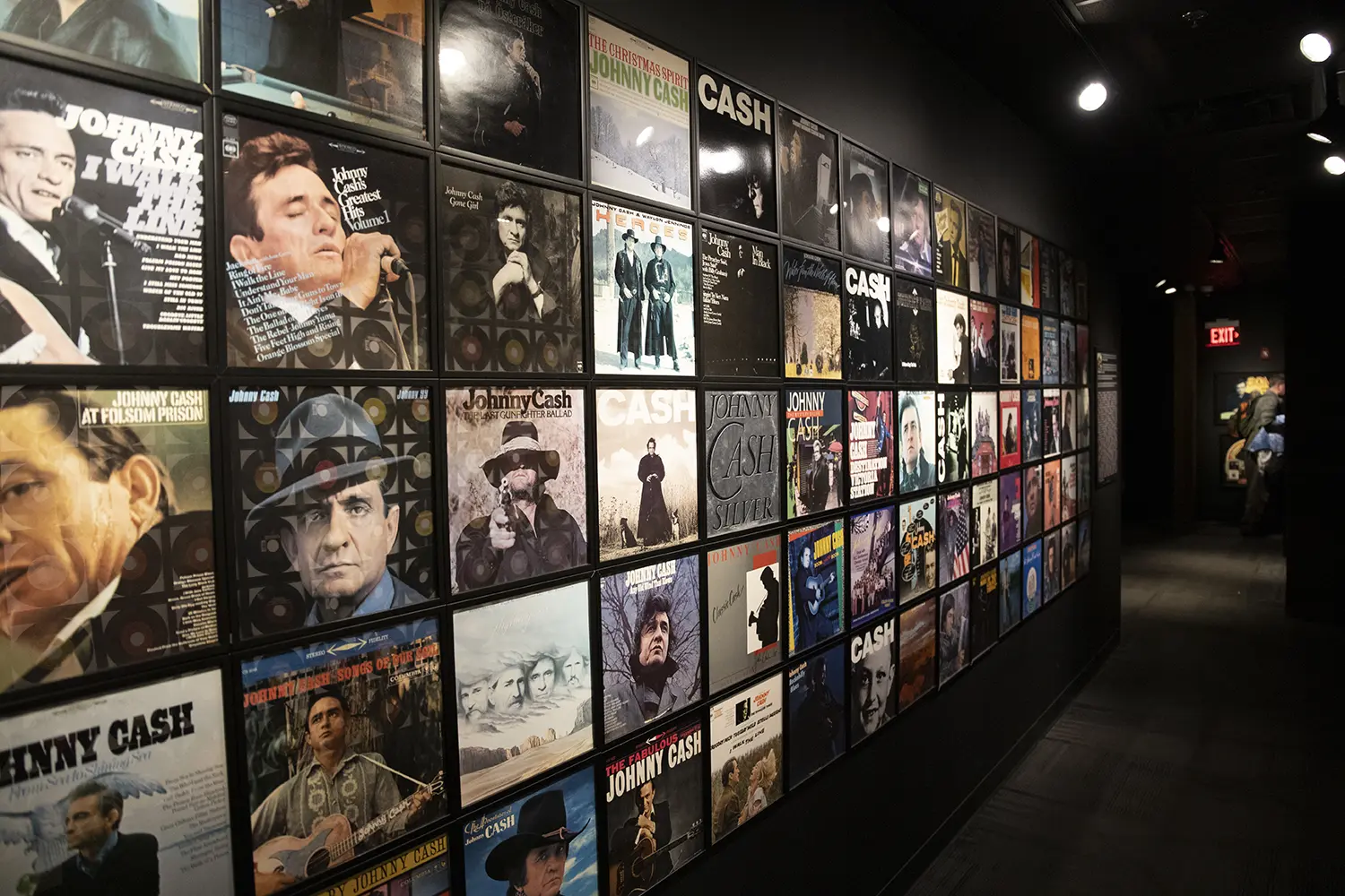 A wall covered with Johnny Cash album covers at the Johnny Cash Museum in Nashville Tennessee USA