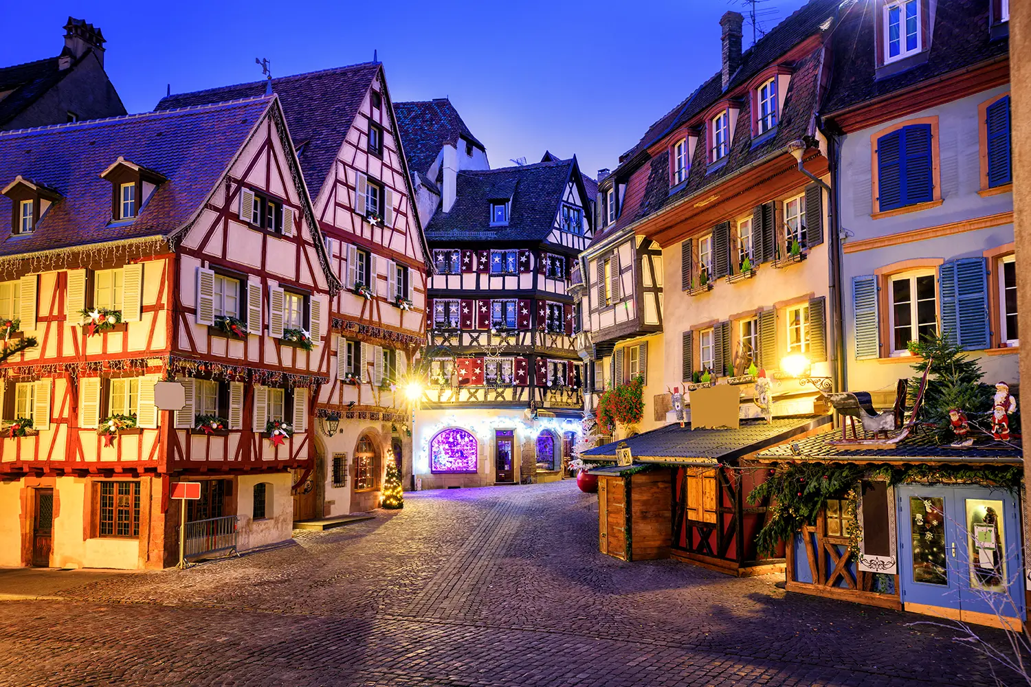 Traditional half-timbered houses in the old town of Colmar decorated for christmas, Alsace, France