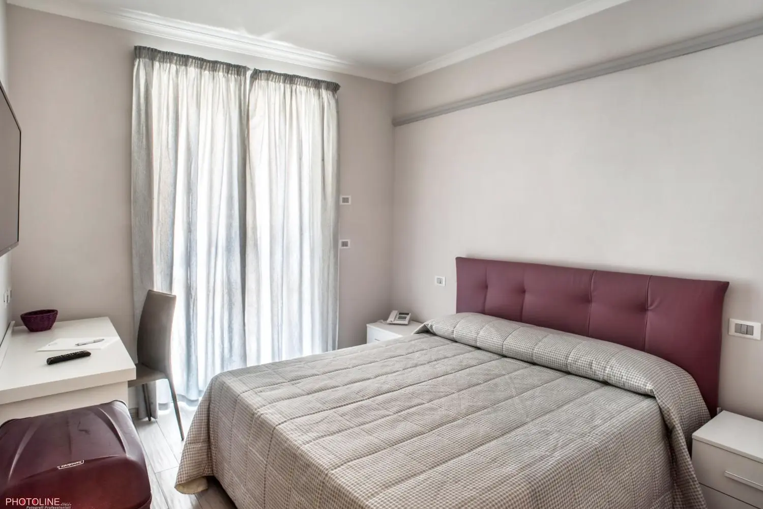 A room with a bed at Hotel Villa Giulia