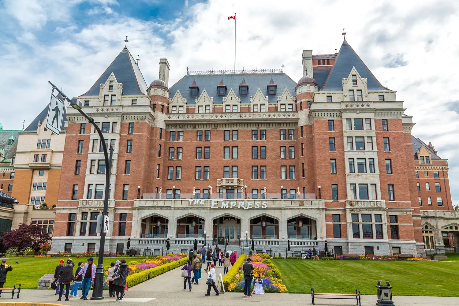 Tourists at The Empress Hotel in Victoria, Canada