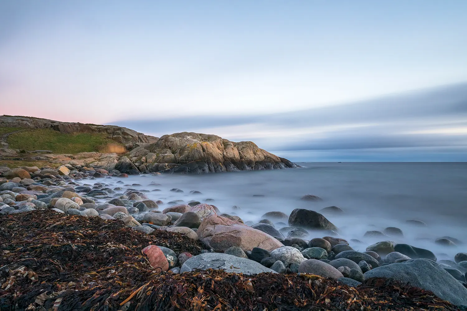 Pebble shore at Hove, Tromoy in Arendal, Norway. Raet National Park.